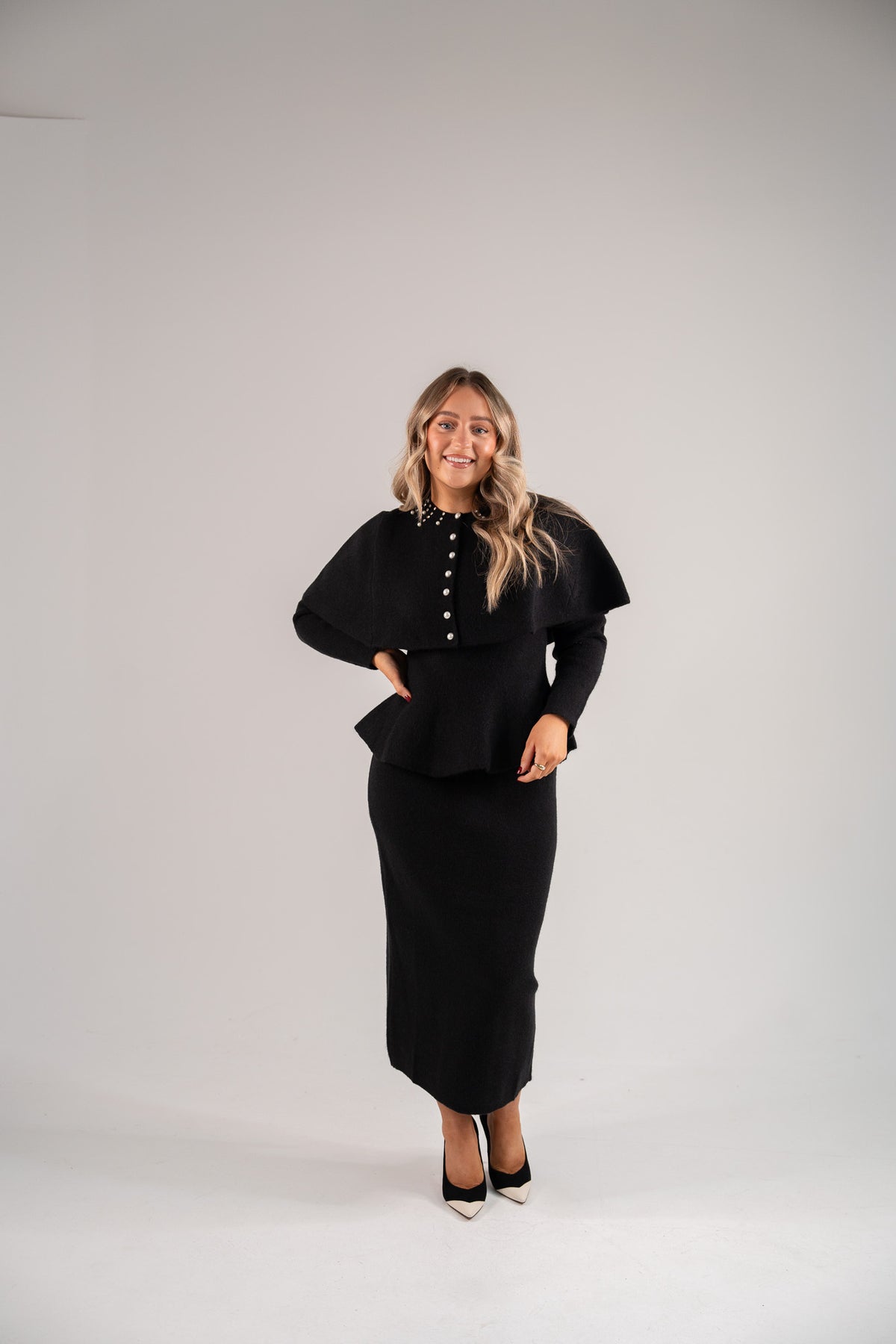 Love Laura Knit Peplum Top In Black