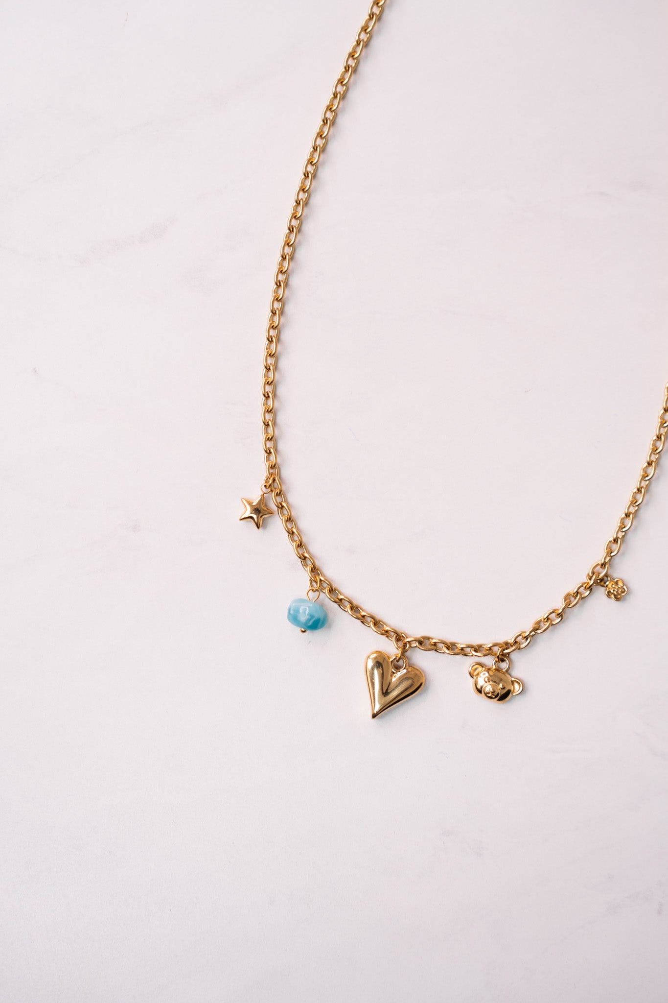 Olive Blue Stone Charm Necklace In Gold