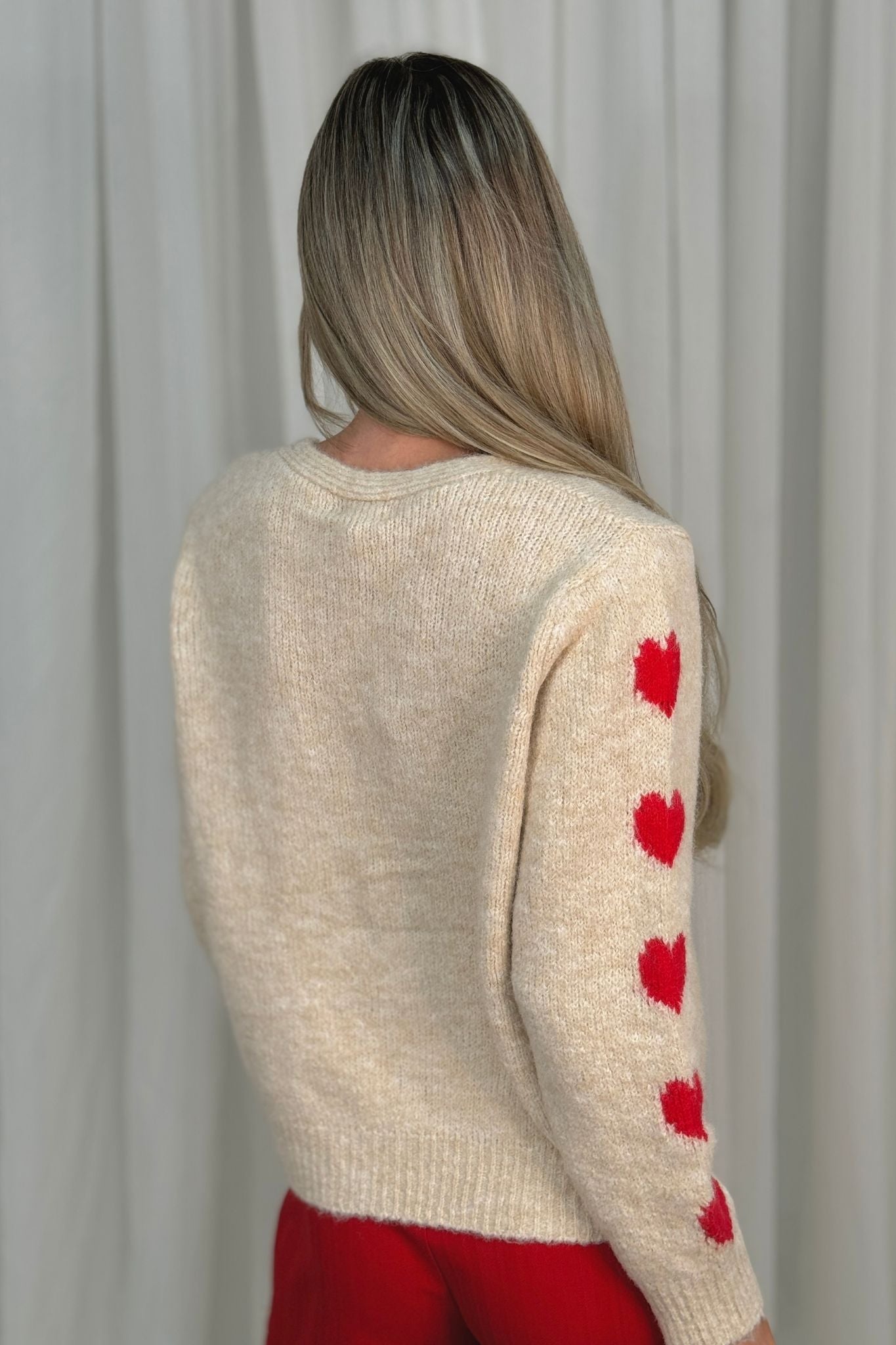 Kendra Red Bow Cardigan In Cream