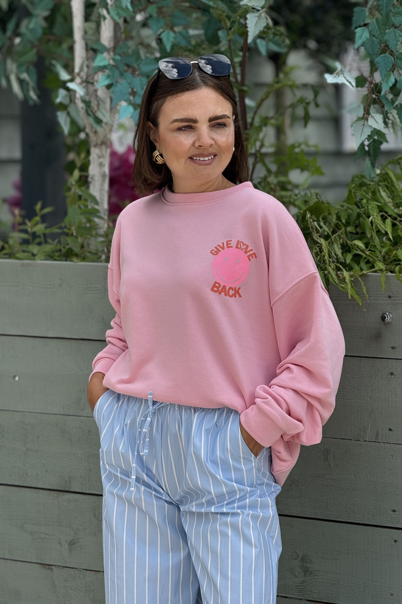 Melanie Smiley Graphic Sweatshirt In Pink