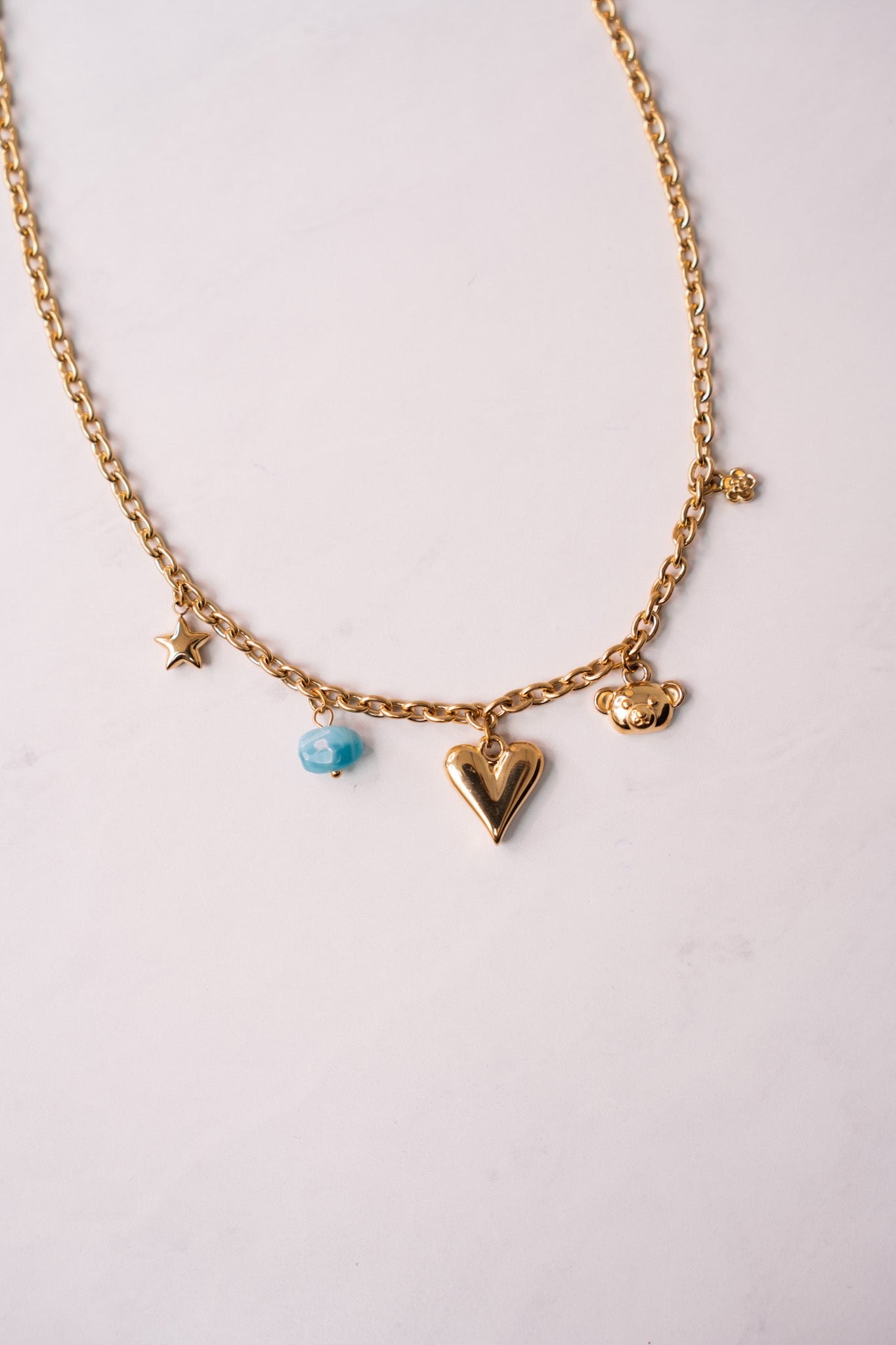 Olive Blue Stone Charm Necklace In Gold