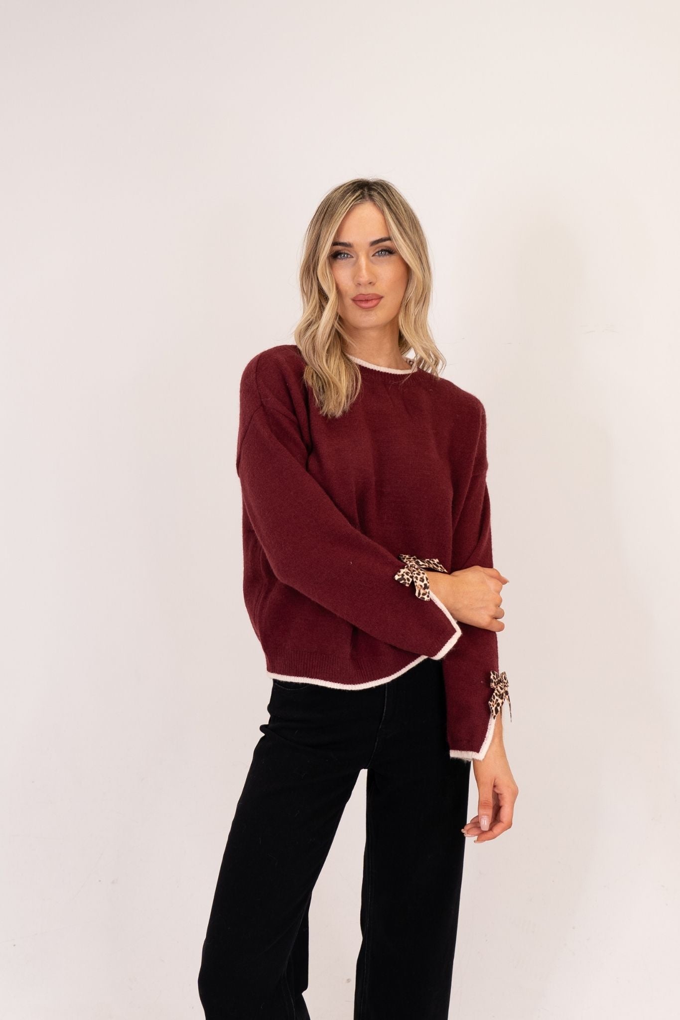 Kendra Leopard Bow Cuff Jumper In Bordeaux