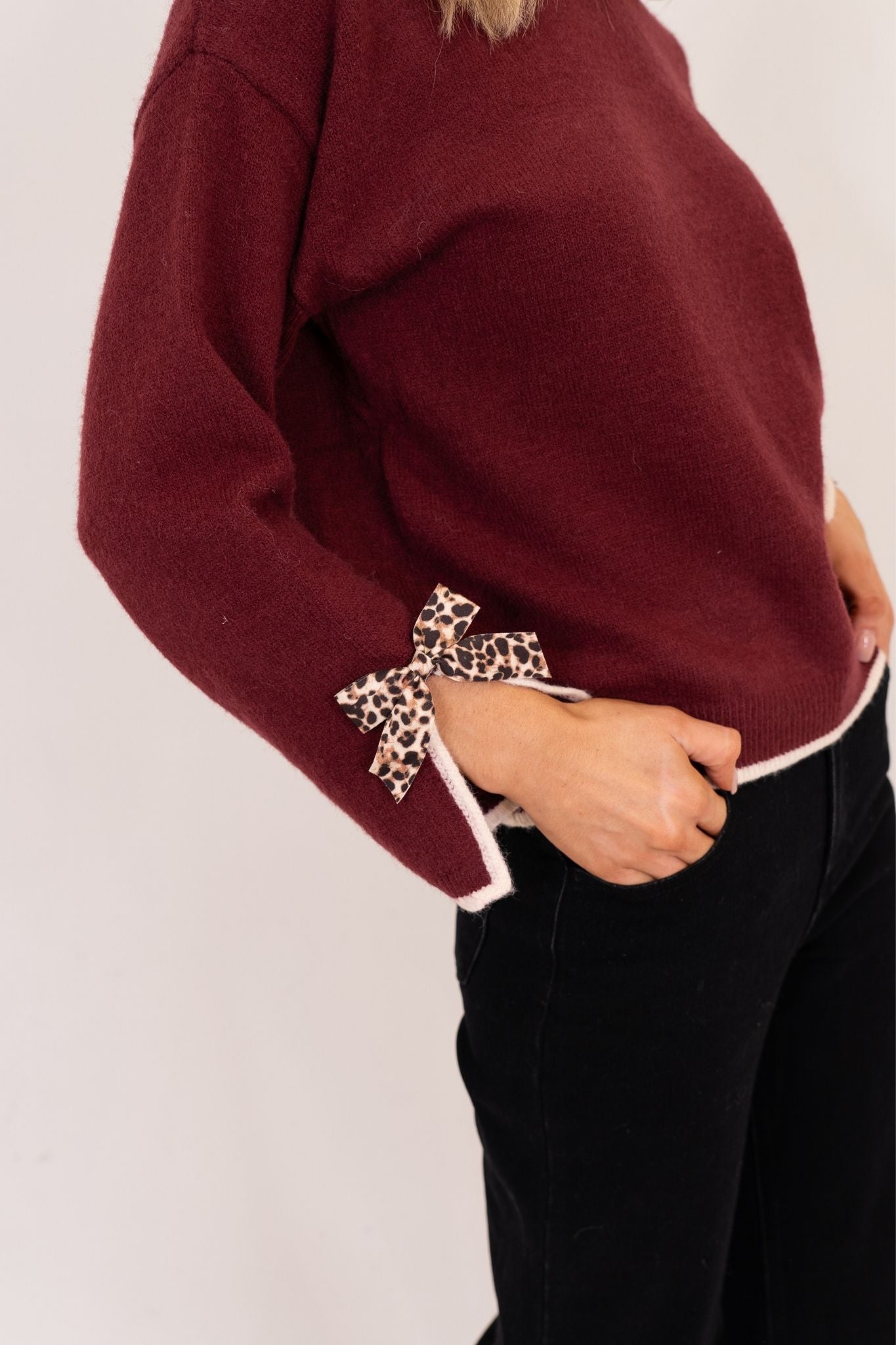 Kendra Leopard Bow Cuff Jumper In Bordeaux