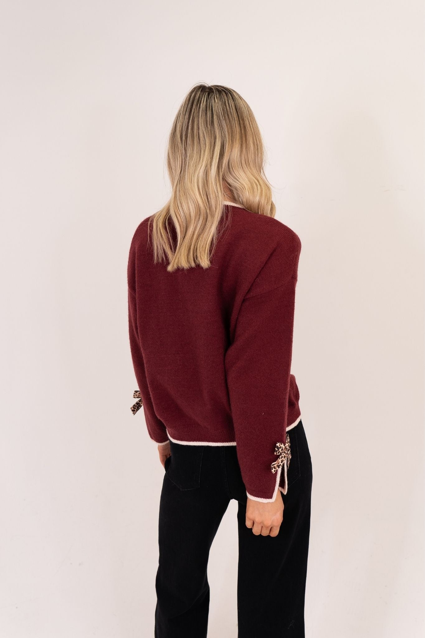 Kendra Leopard Bow Cuff Jumper In Bordeaux