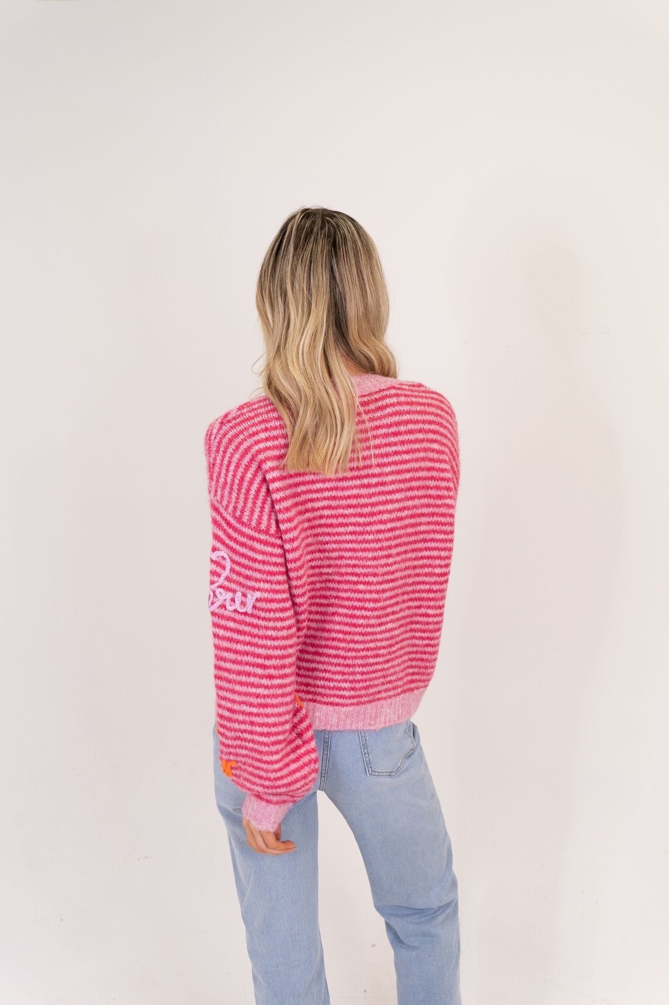 Millie Multi Slogan Jumper In Pink