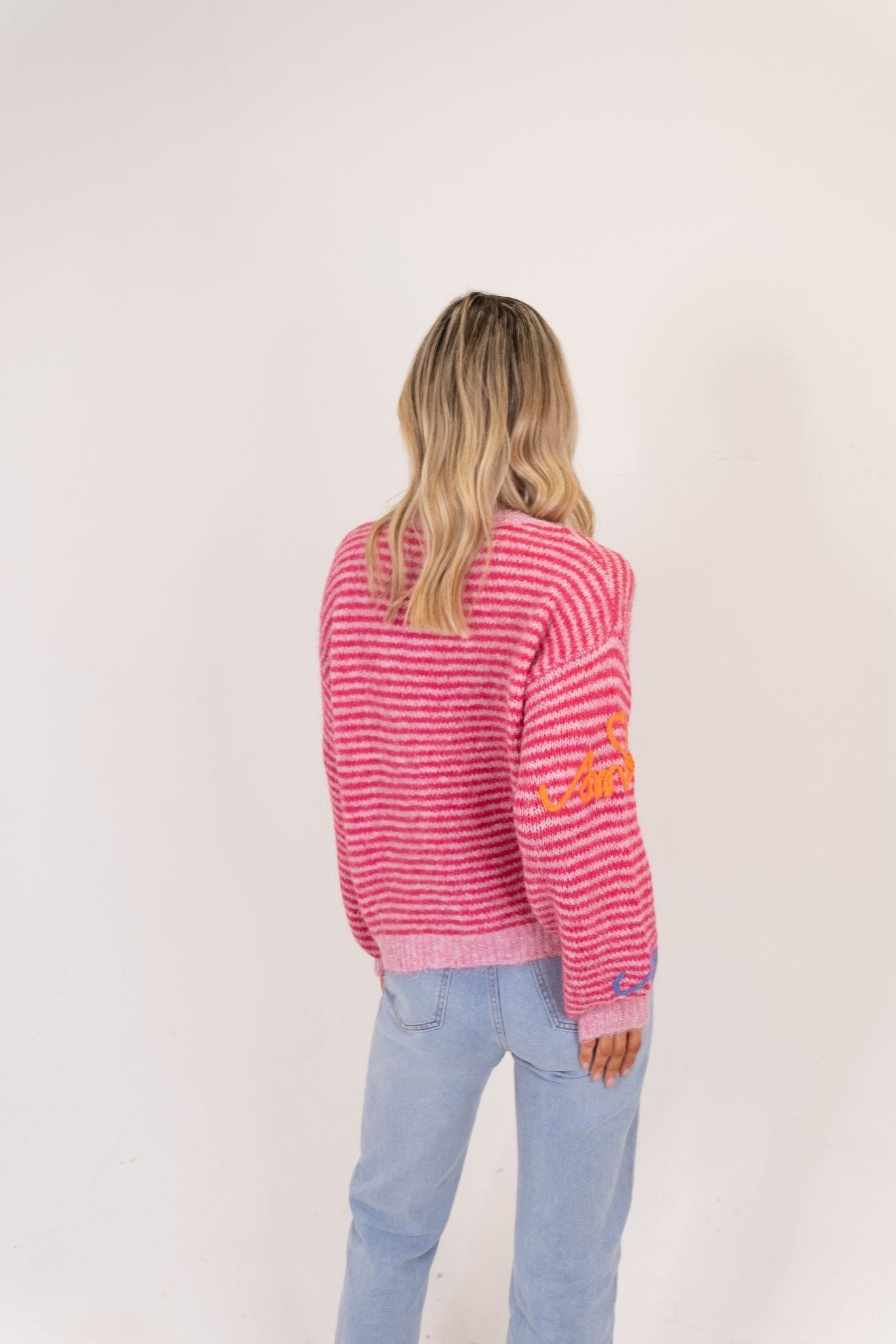 Millie Multi Slogan Jumper In Pink