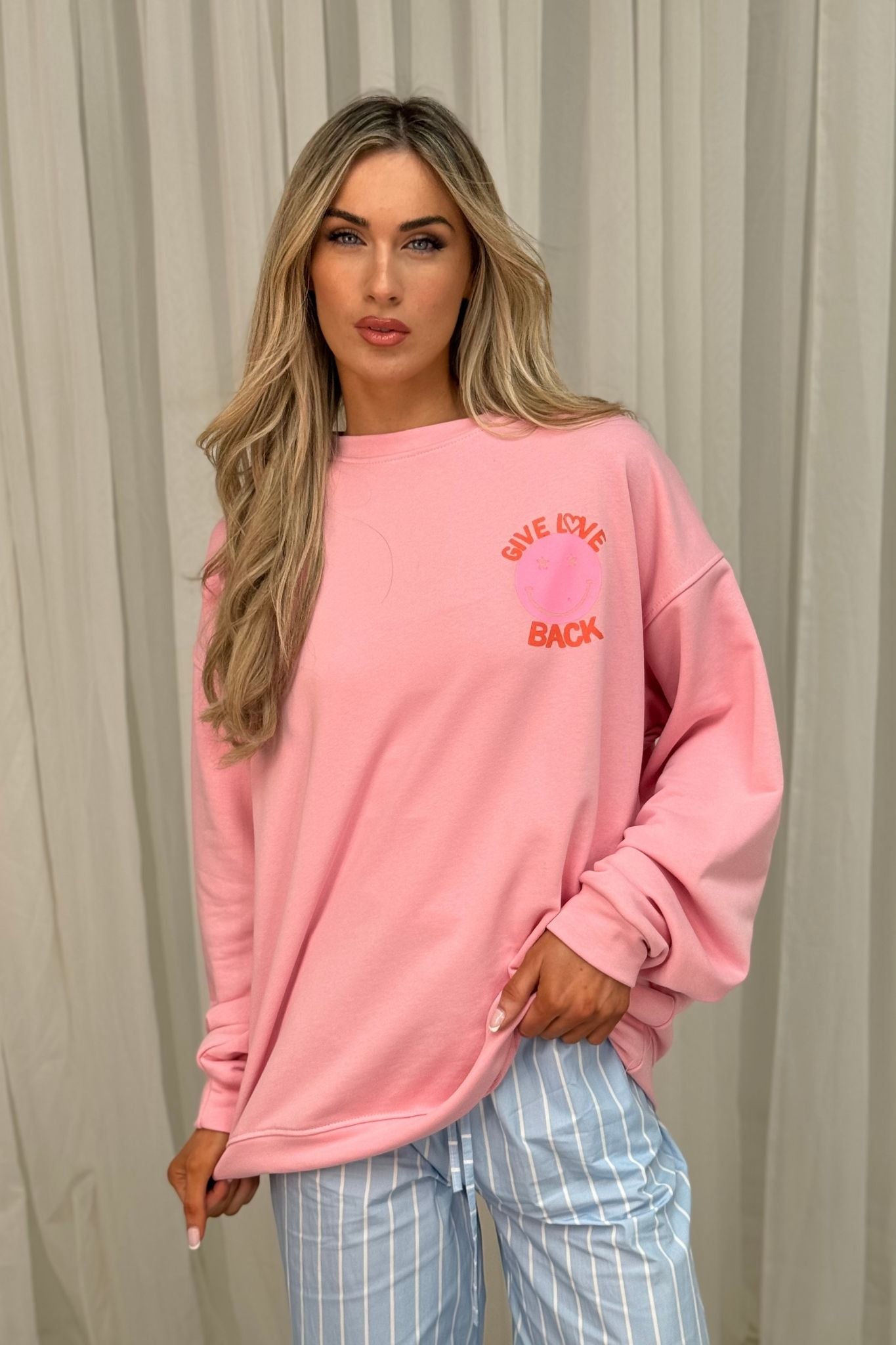 Melanie Smiley Graphic Sweatshirt In Pink