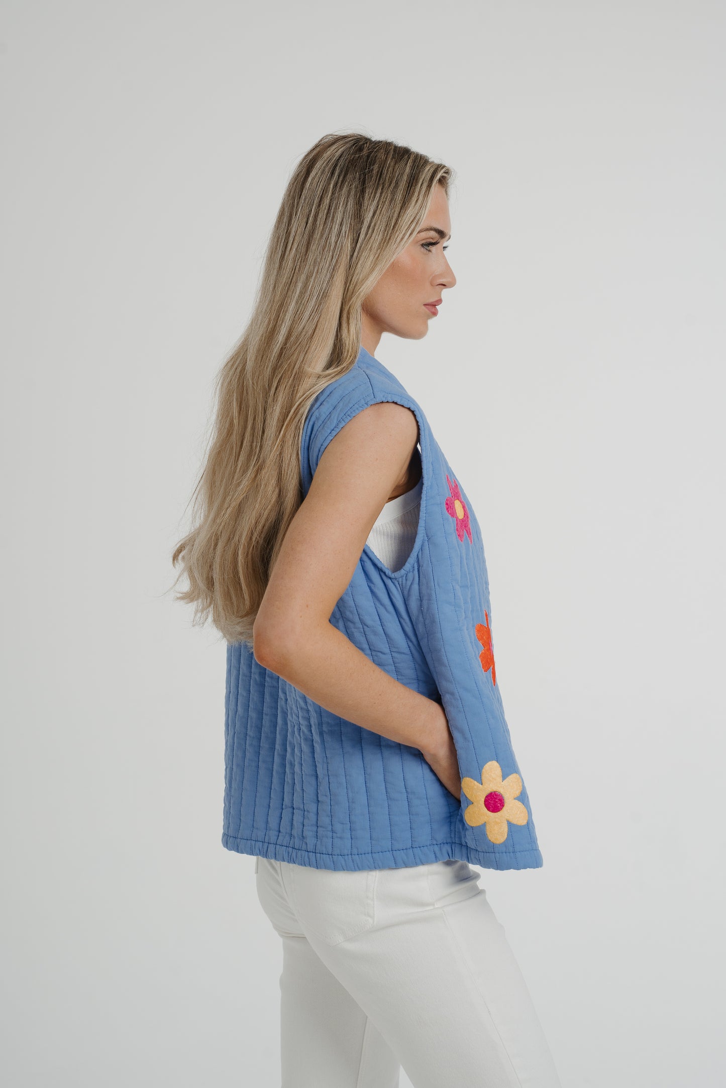 Poppy Floral Quilted Gilet In Blue