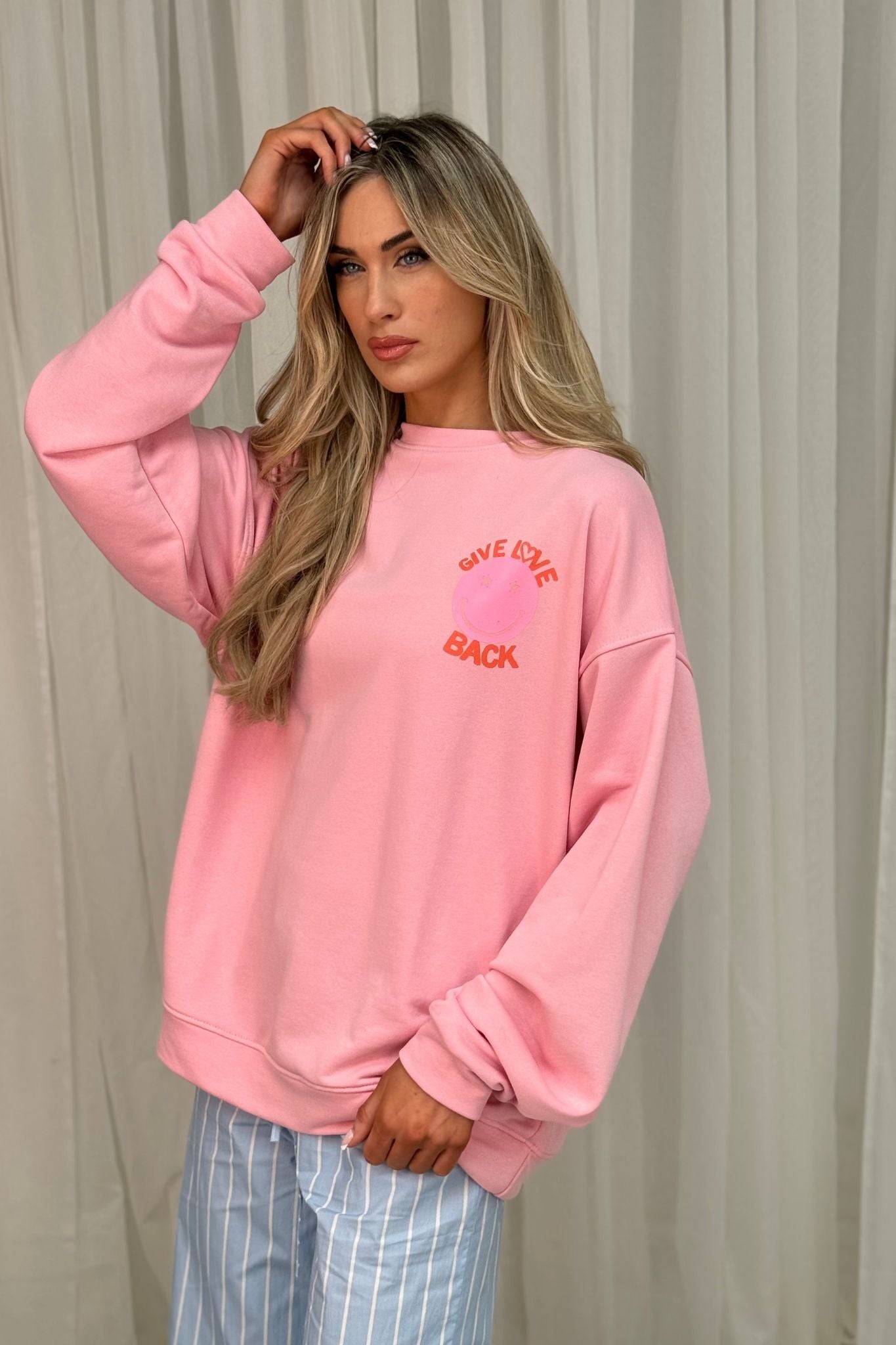 Melanie Smiley Graphic Sweatshirt In Pink