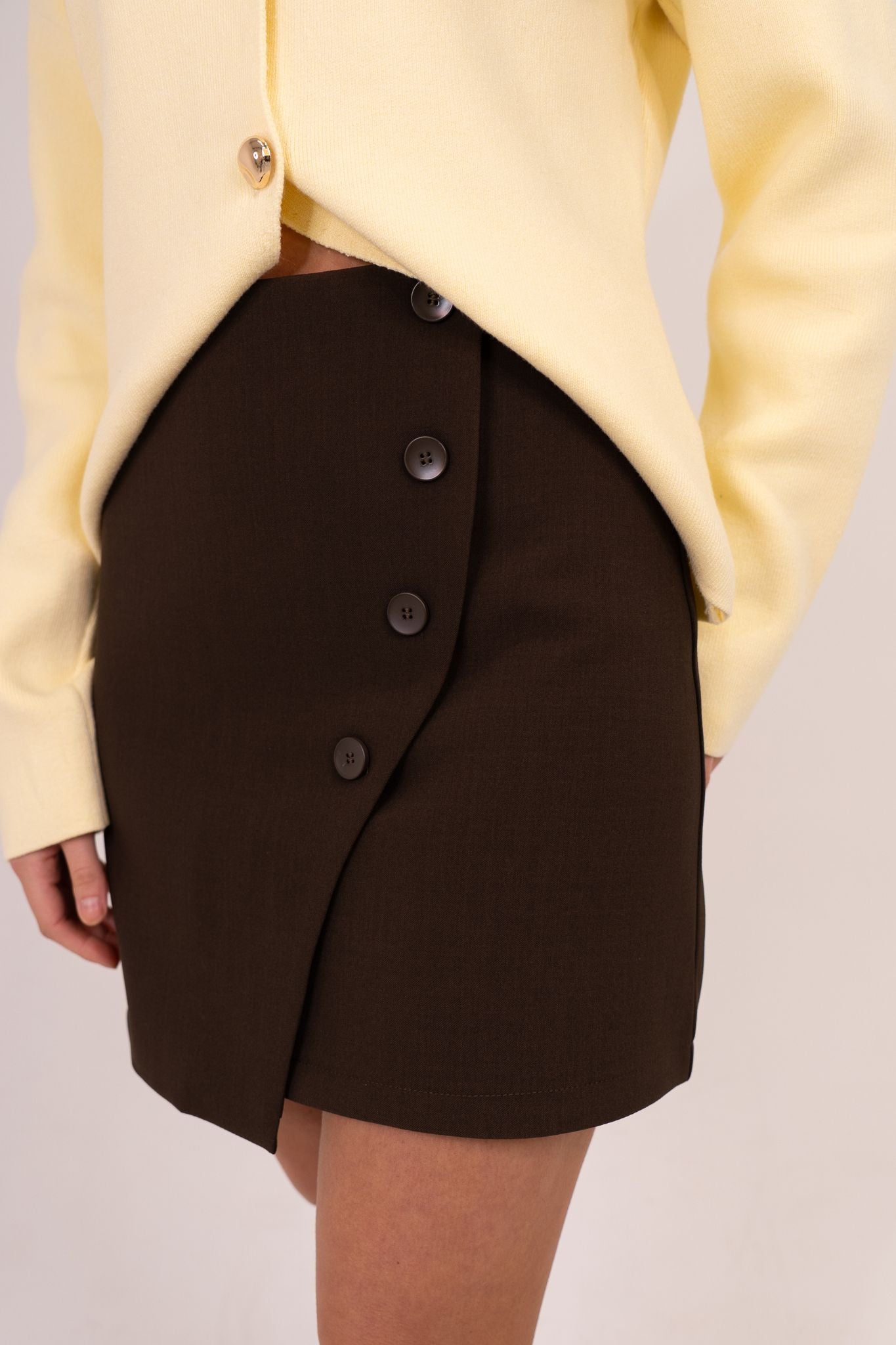 Kiera Asymmetric Button Skirt In Chocolate