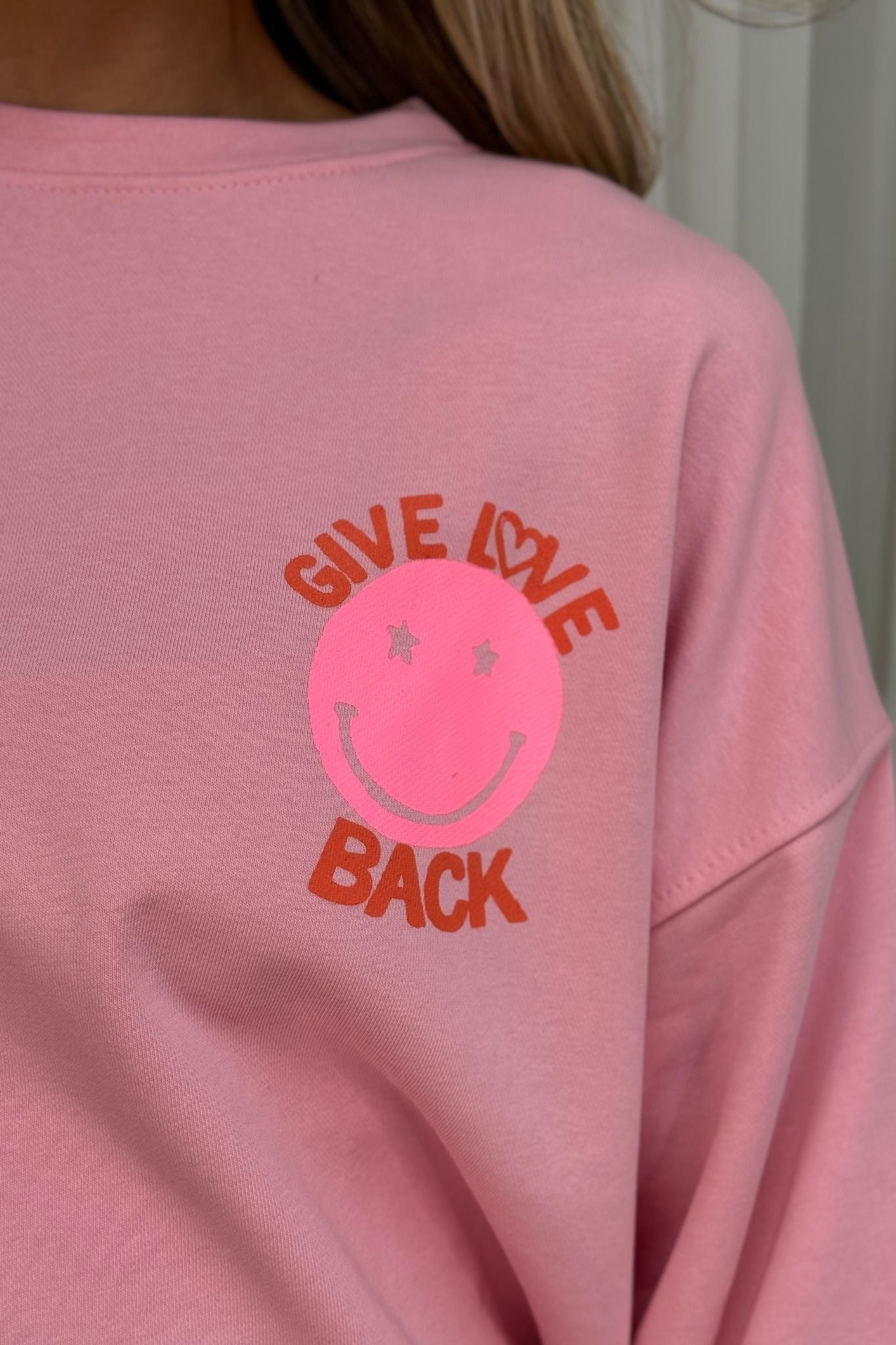 Melanie Smiley Graphic Sweatshirt In Pink