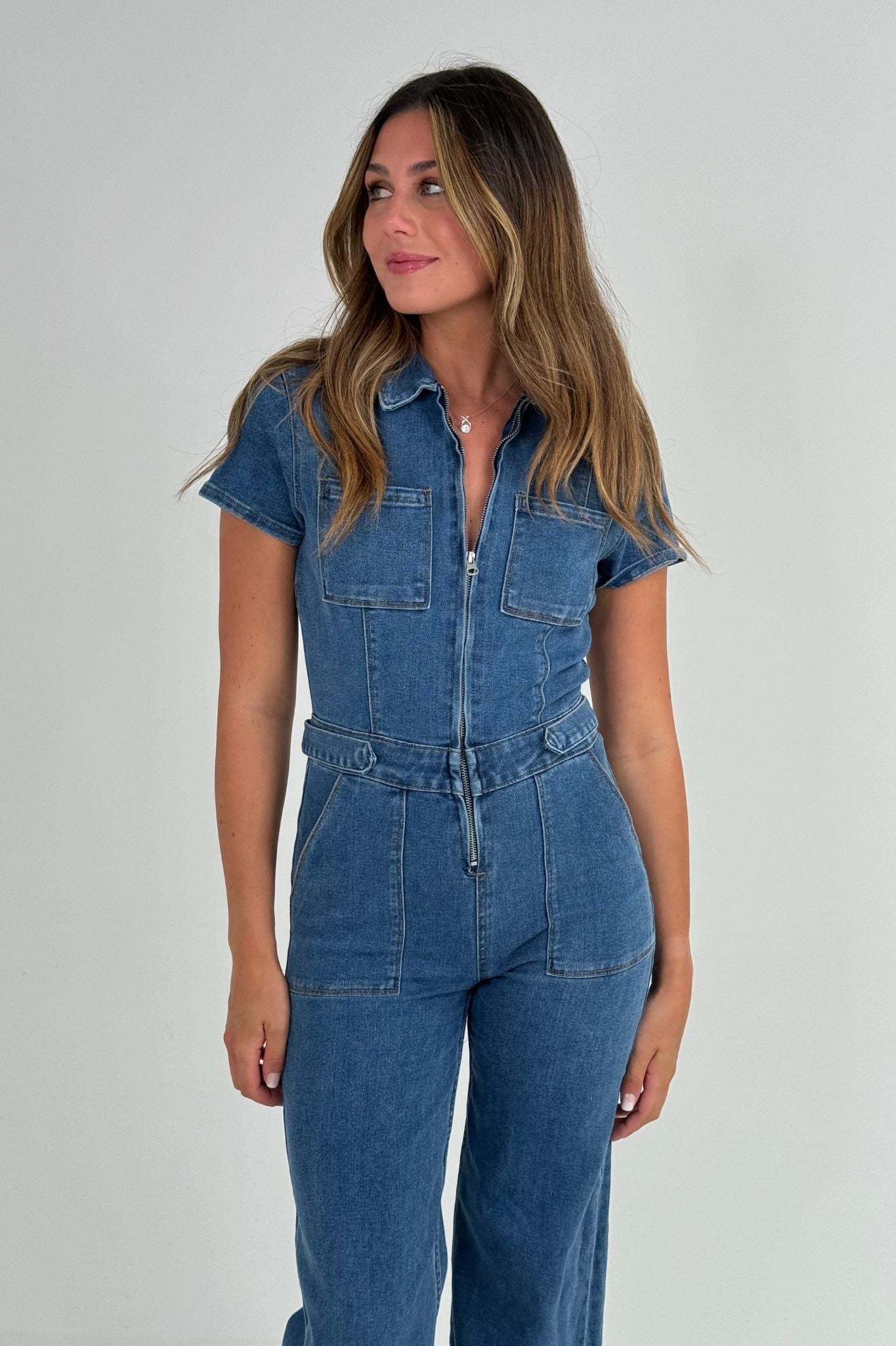 Freya Zip Jumpsuit In Mid Wash