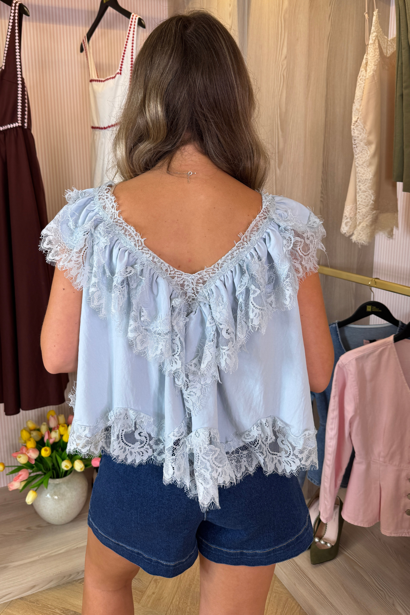 Elsa Sleeveless Ruffle Top In Blue