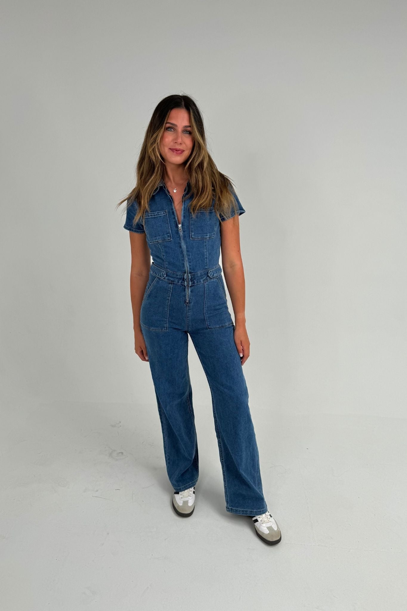 Freya Zip Jumpsuit In Mid Wash