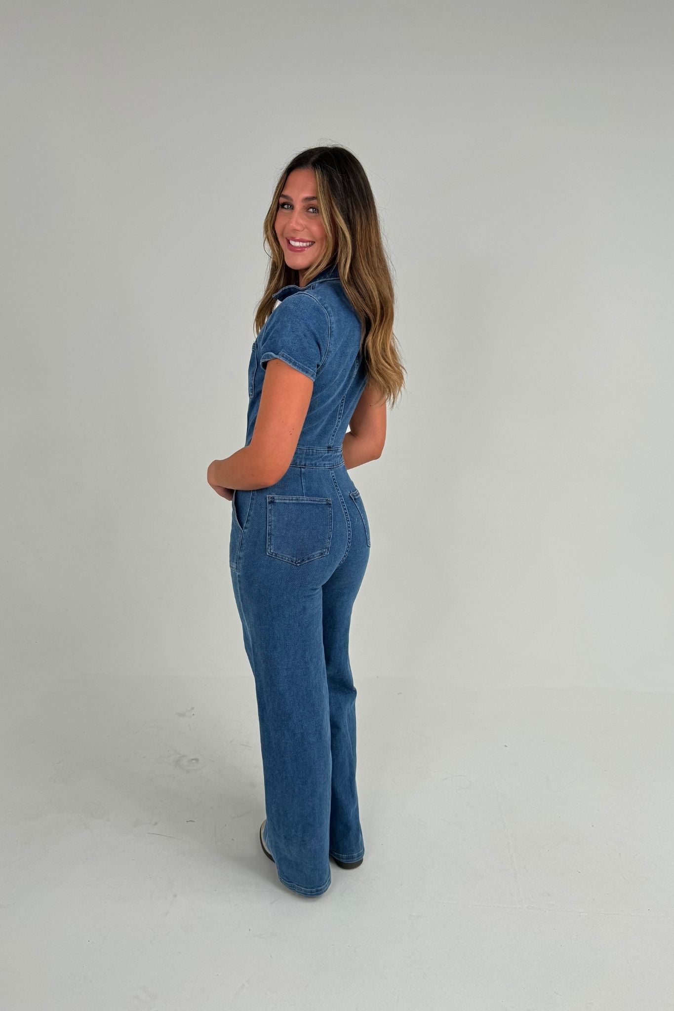 Freya Zip Jumpsuit In Mid Wash