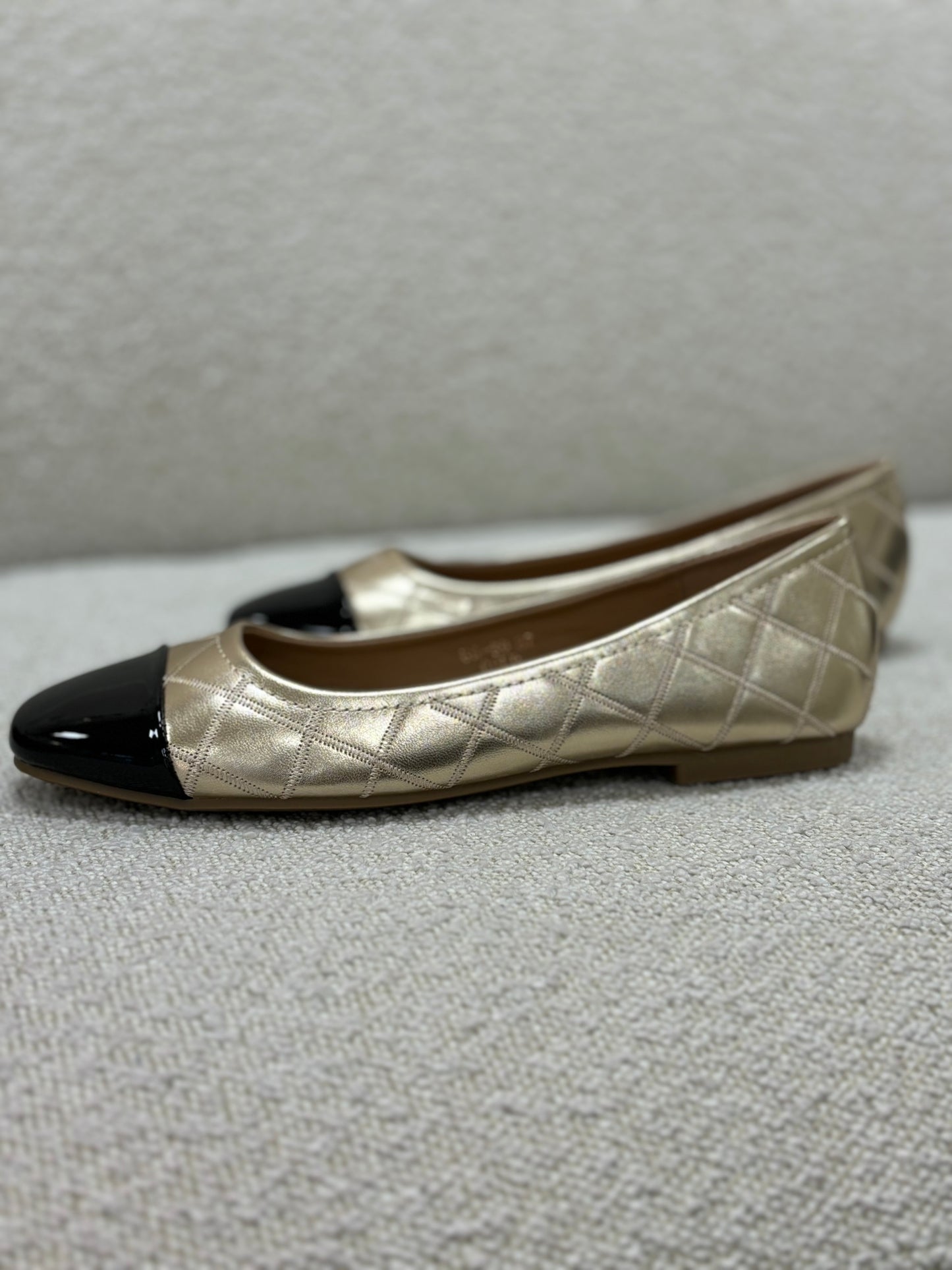 Ellen Quilted Black Toe Pump In Gold