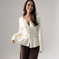 Ally Peplum Cardigan In Cream