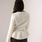 Ally Peplum Cardigan In Cream