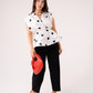 Caitlyn Polka Dot Peplum Top In Monochrome
