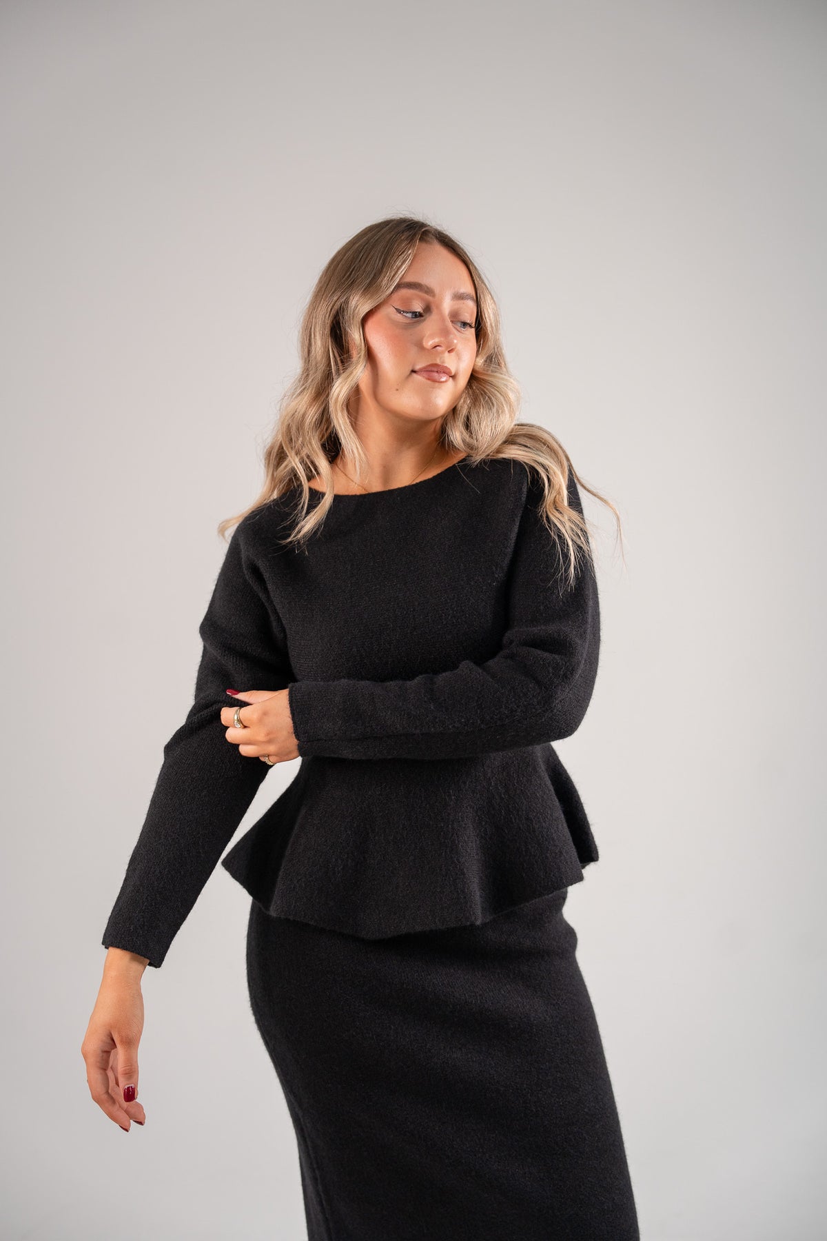 Love Laura Knit Peplum Top In Black