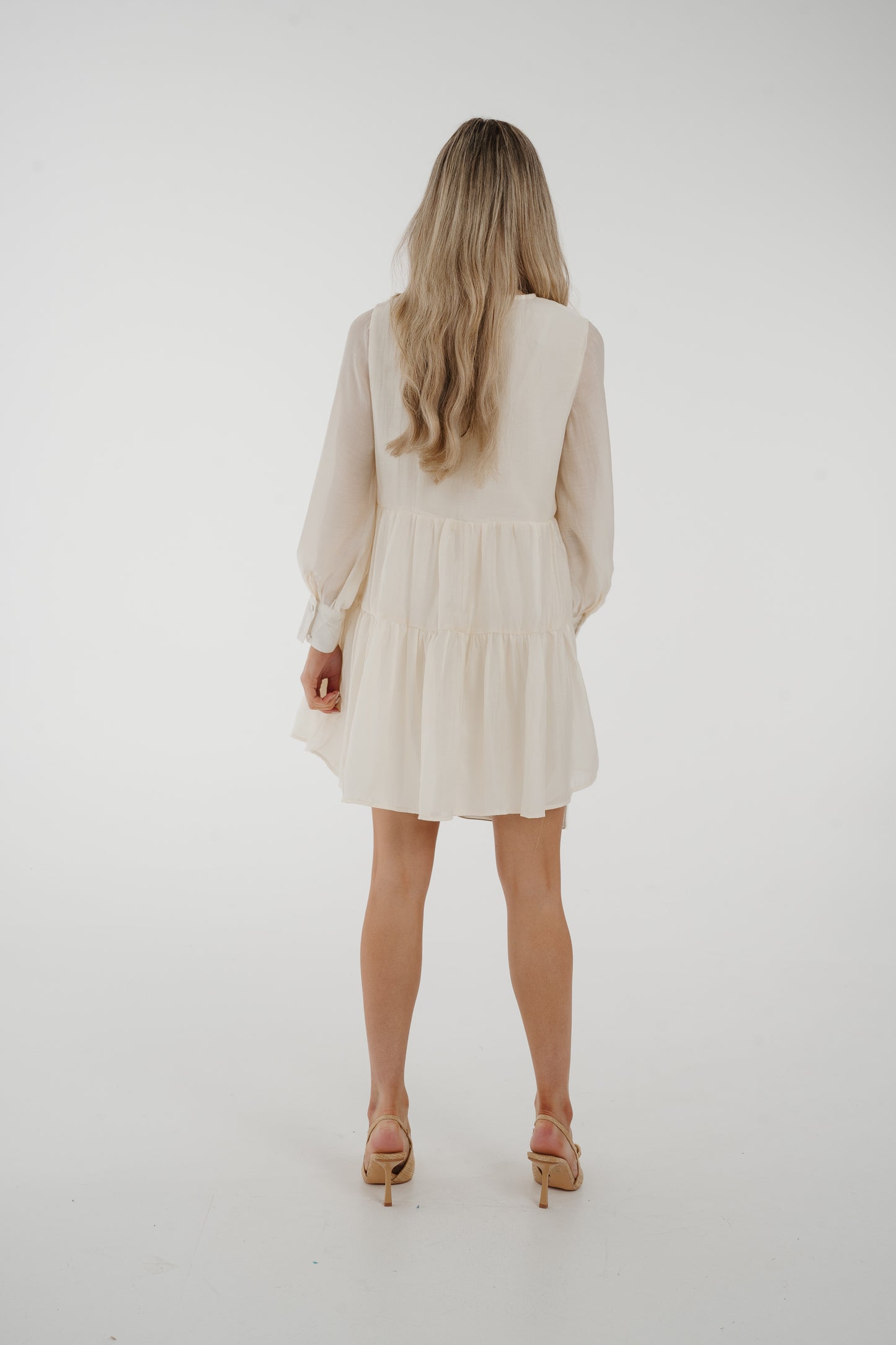 Elsa Button Front Peplum Dress In Cream