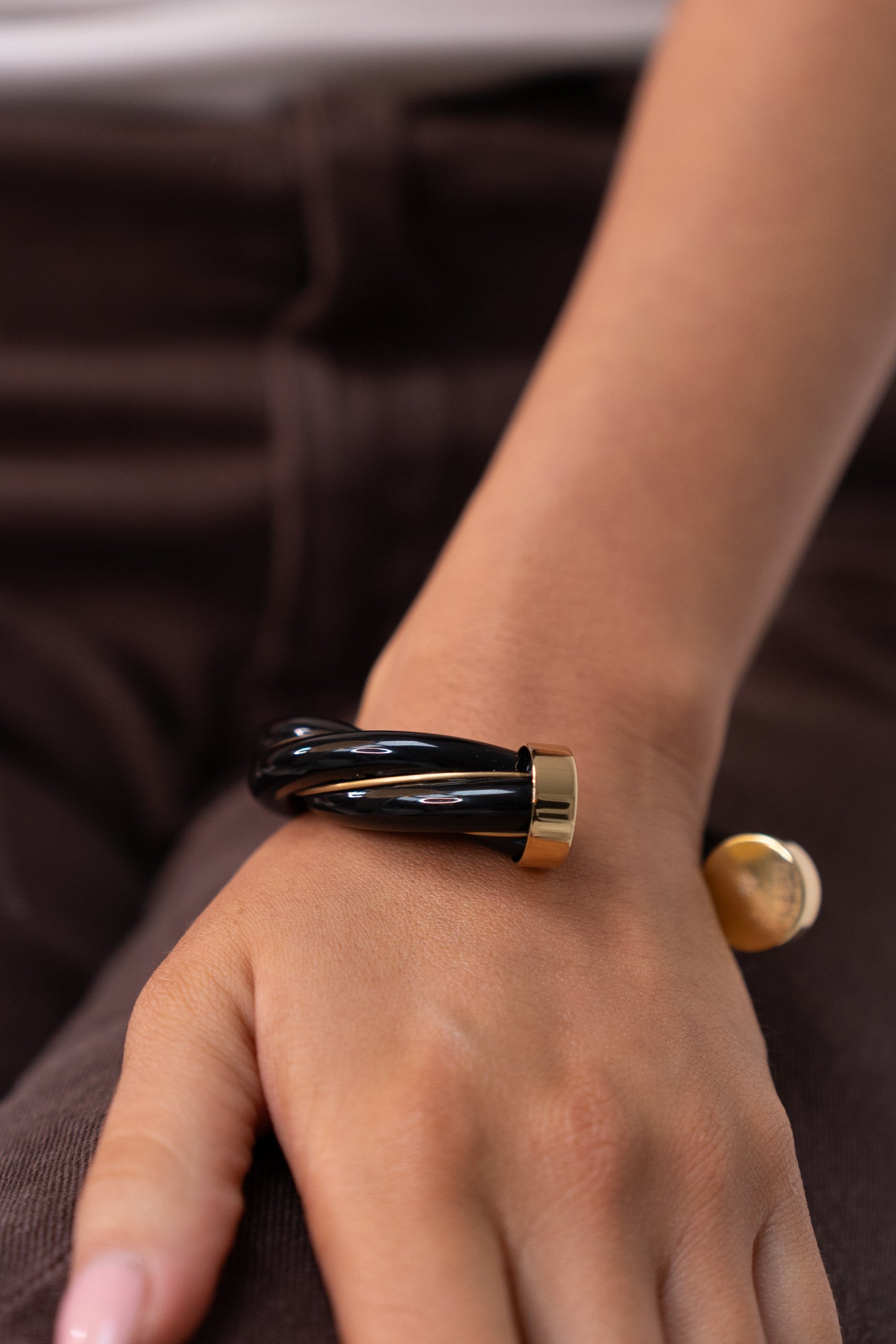 Ruby Twist Bangle In Black