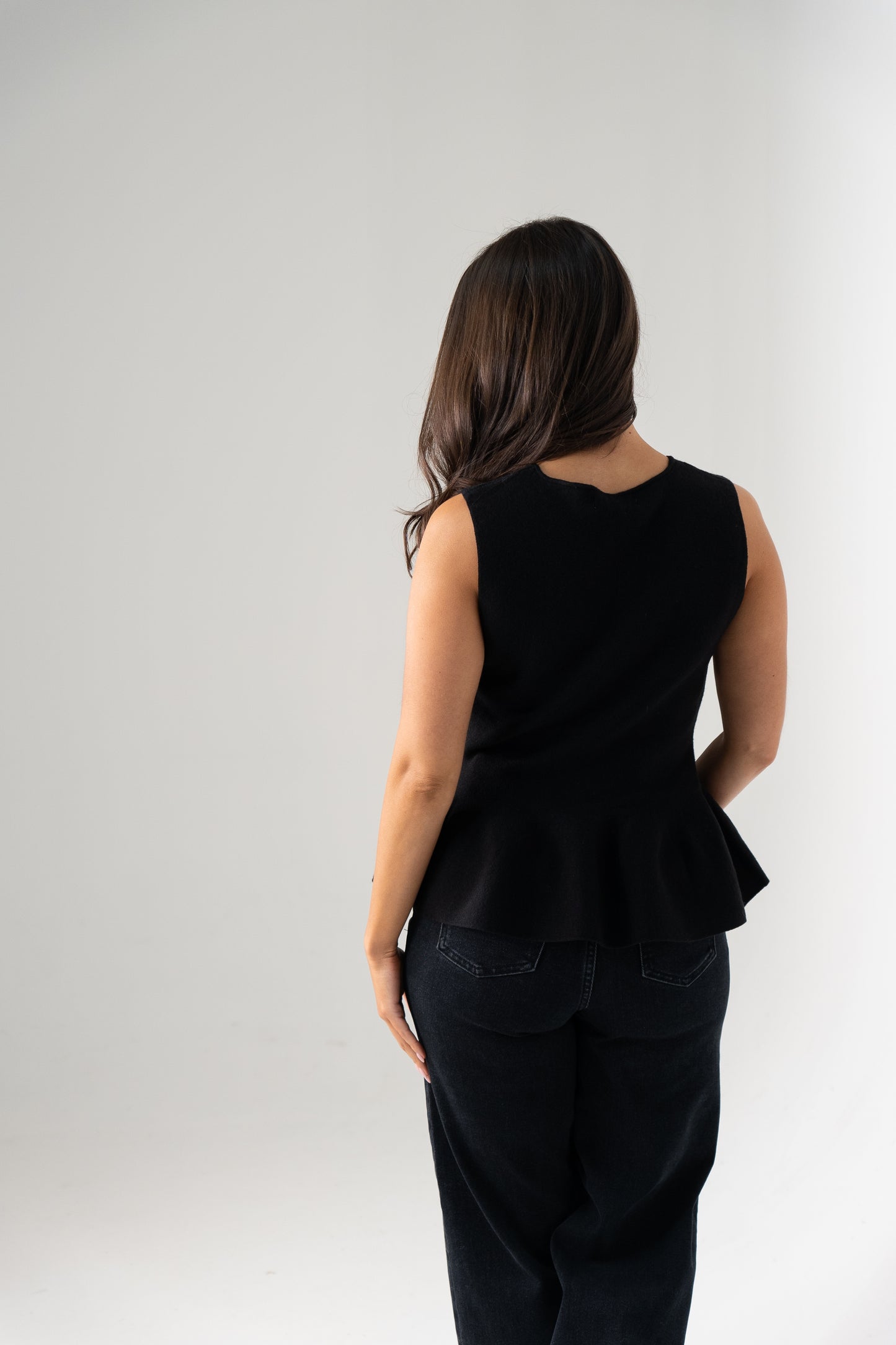 Kendra Split Neck Peplum Waistcoat In Black