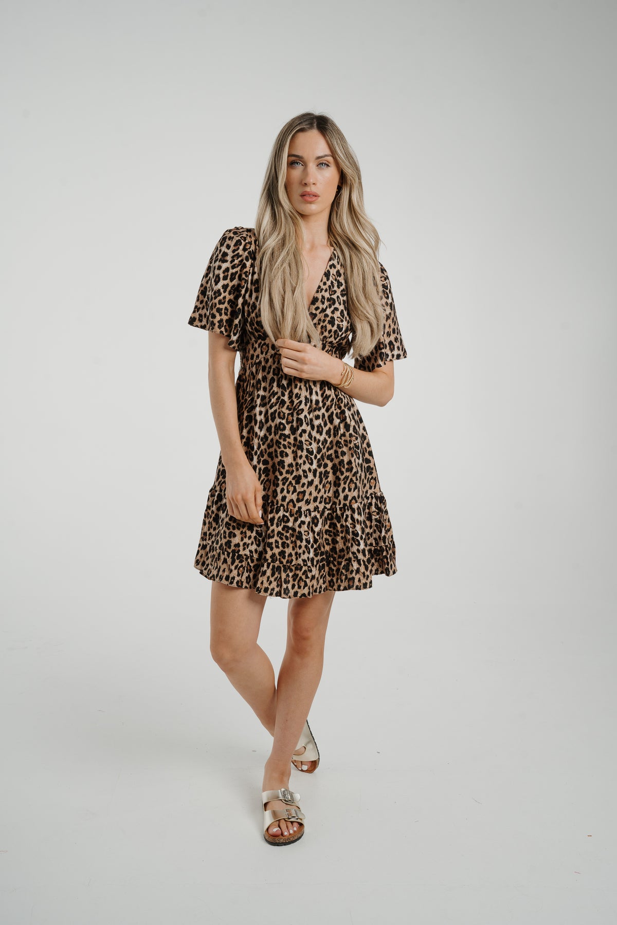Ally Peplum Mini Dress In Leopard Print