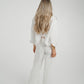 Elsa Tie Waist Pinstripe Trousers In White