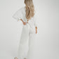 Elsa Tie Waist Pinstripe Trousers In White