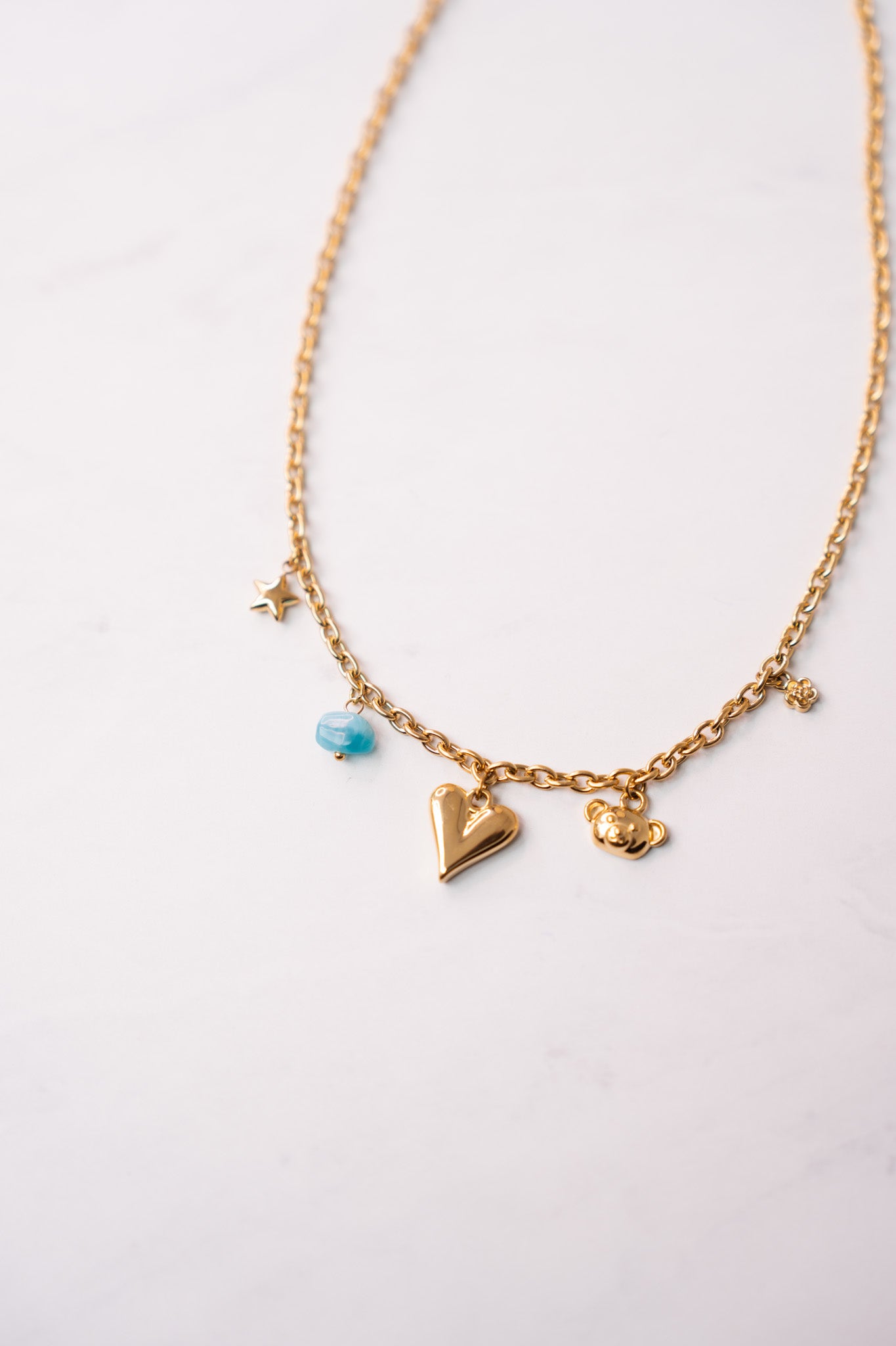 Olive Blue Stone Charm Necklace In Gold