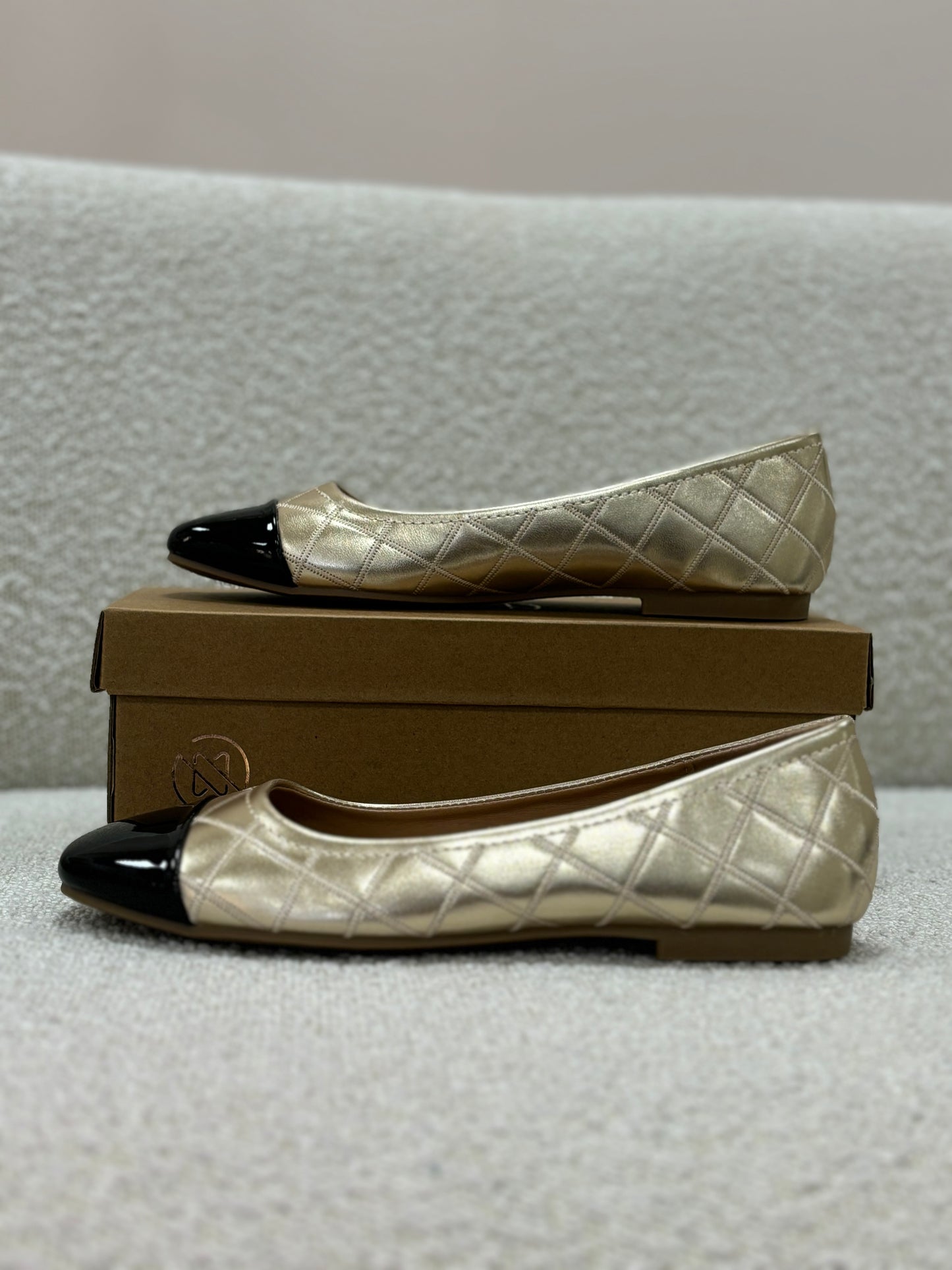 Ellen Quilted Black Toe Pump In Gold