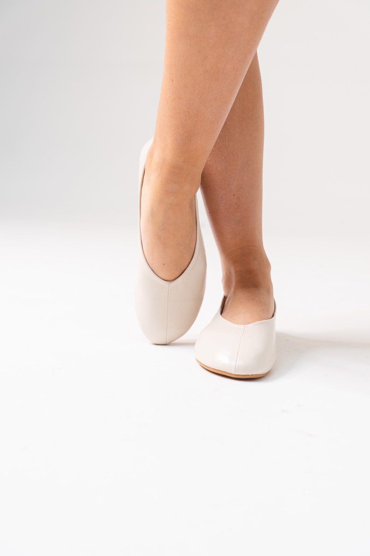 Izzy Faux Leather Pumps In Cream