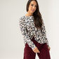 Kendra Button Back Jumper In Leopard Print
