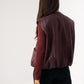 Kendra Faux Leather Sleeveless Jacket In Bordeaux