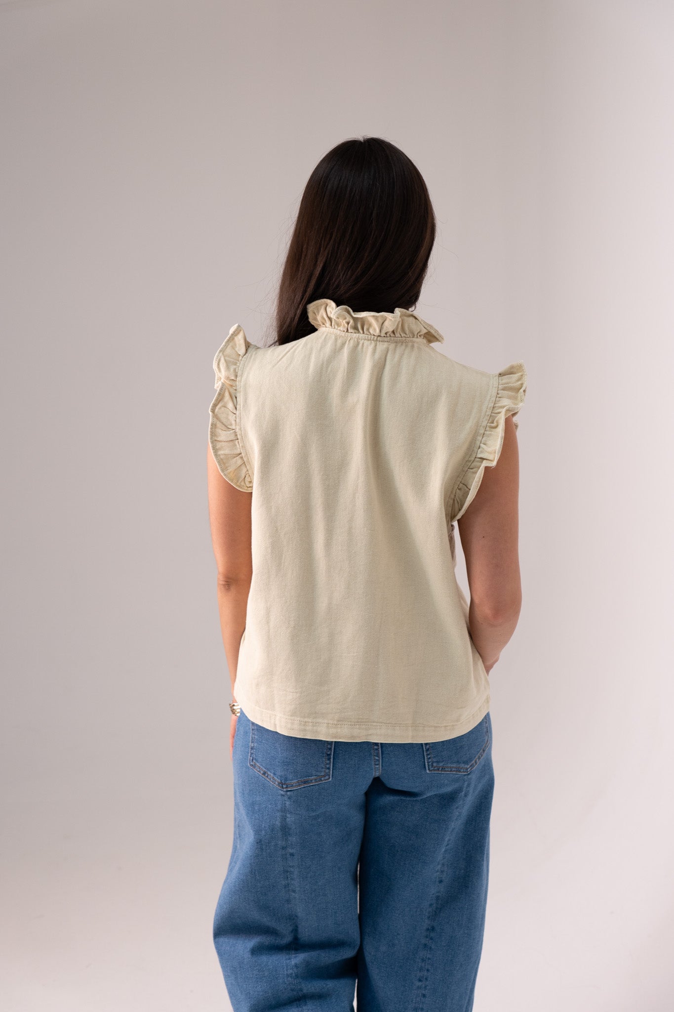 Kendra Frill Sleeve Denim Waistcoat In Beige