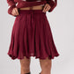 Kendra Pleated Skirt In Bordeaux