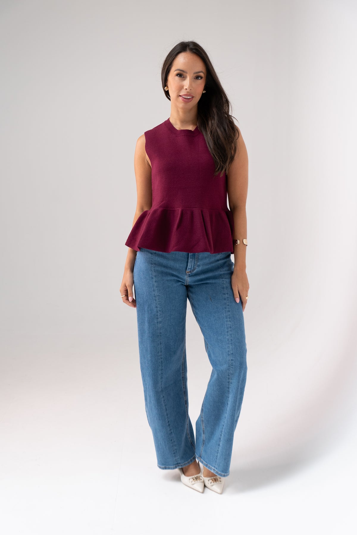 Kendra Sleeveless Peplum Top In Bordeaux