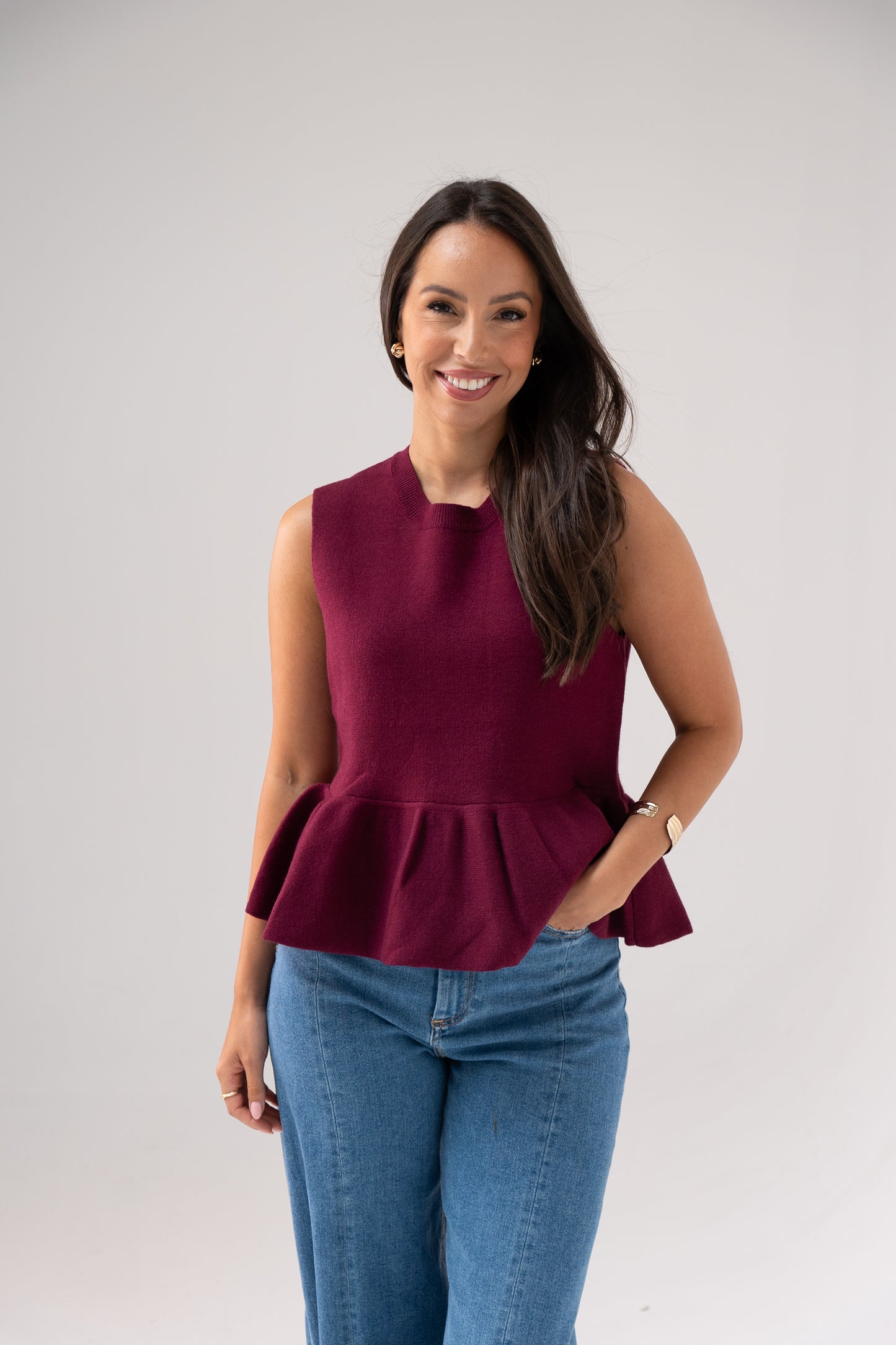 Kendra Sleeveless Peplum Top In Bordeaux