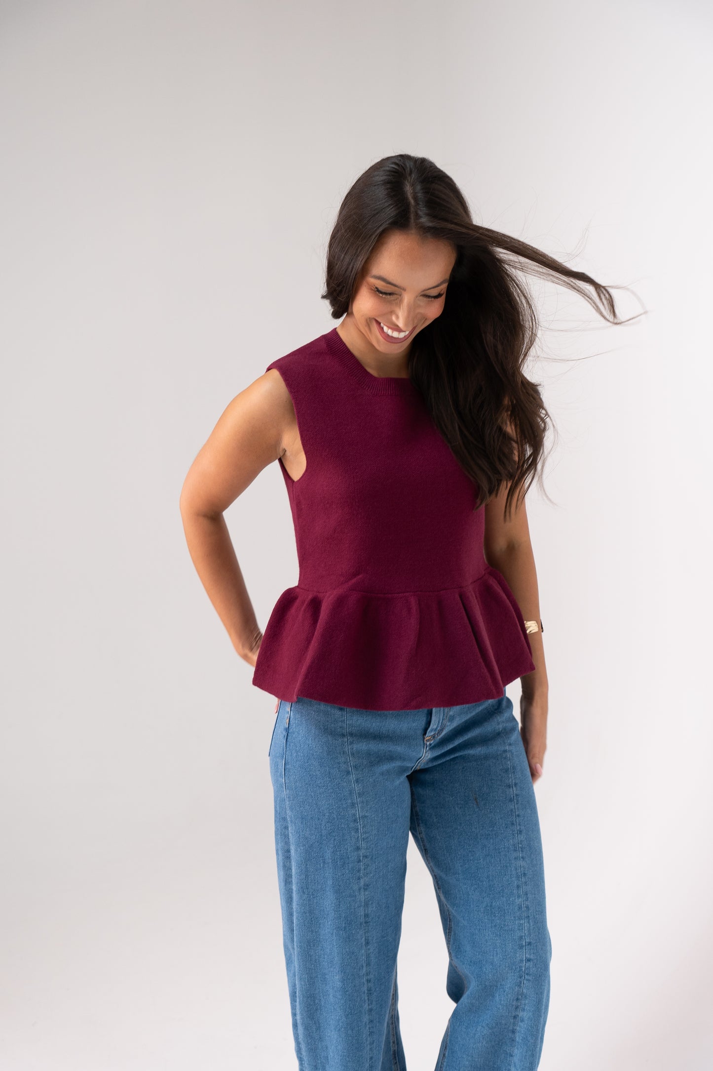 Kendra Sleeveless Peplum Top In Bordeaux