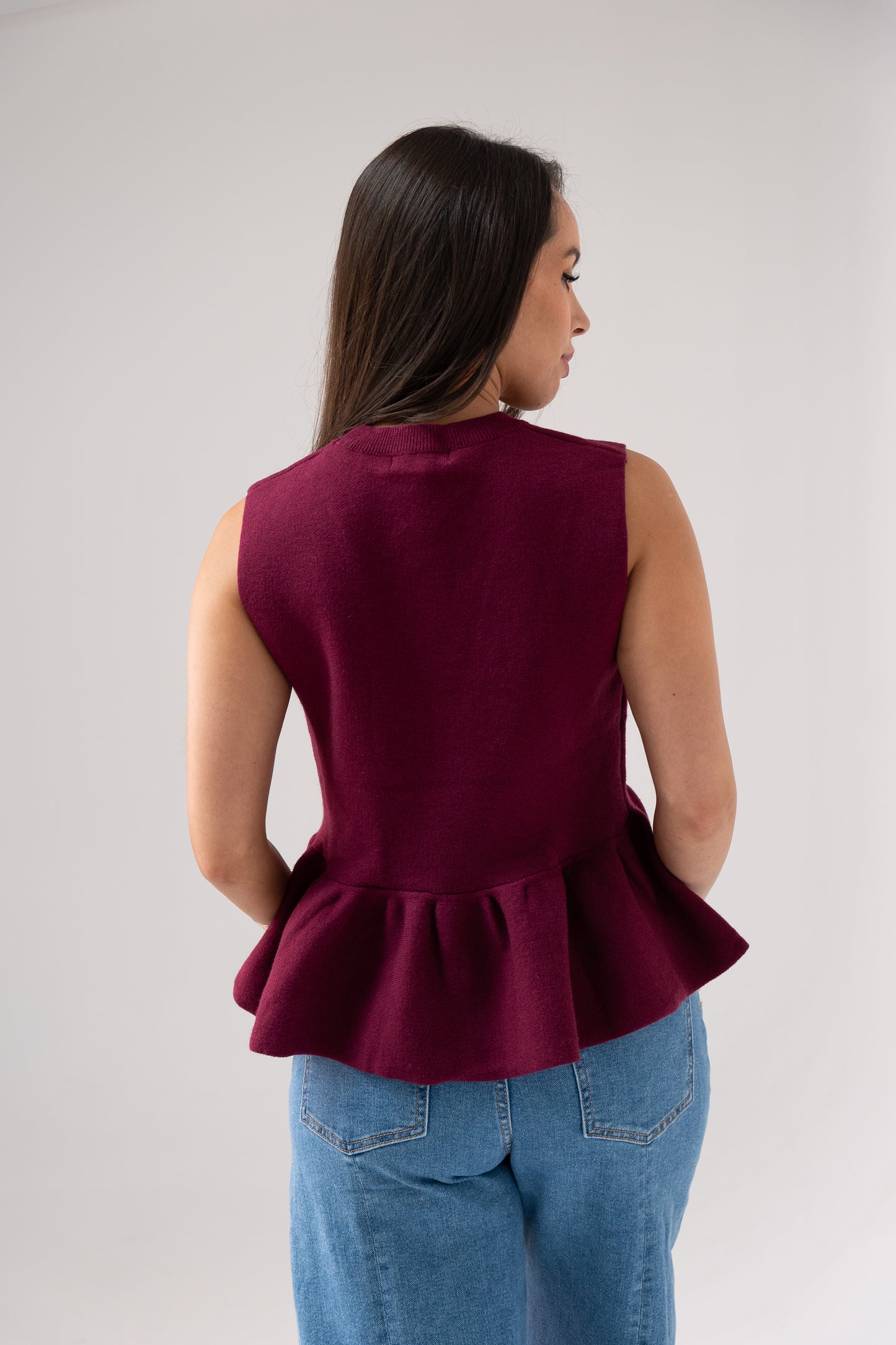 Kendra Sleeveless Peplum Top In Bordeaux