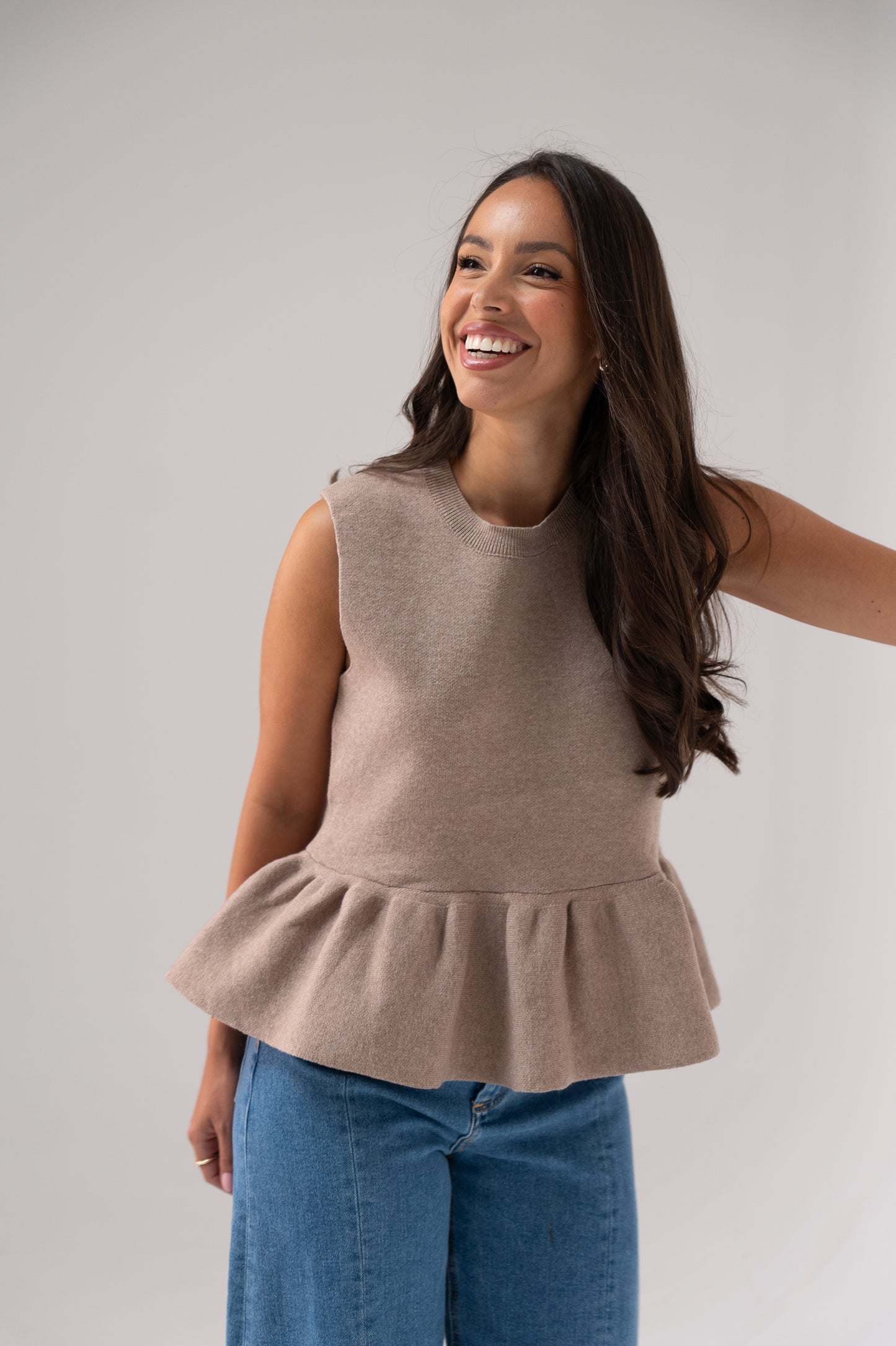 Kendra Sleeveless Peplum Top In Taupe