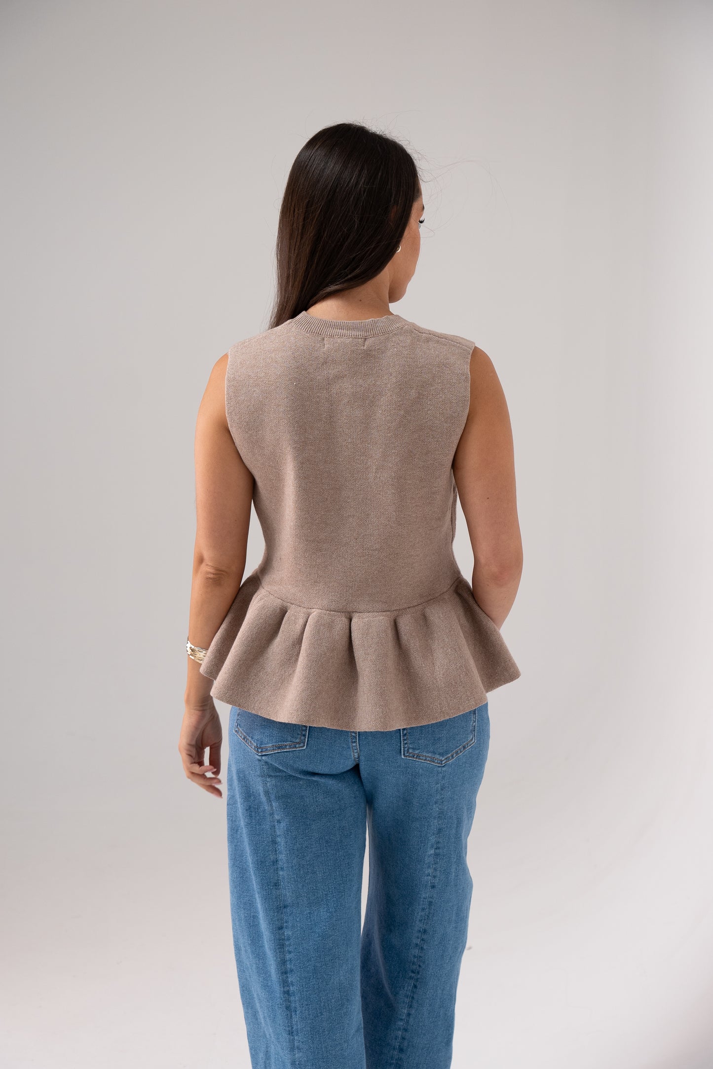 Kendra Sleeveless Peplum Top In Taupe