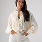 Kendra Tie Neck Ruffle Blouse In Cream