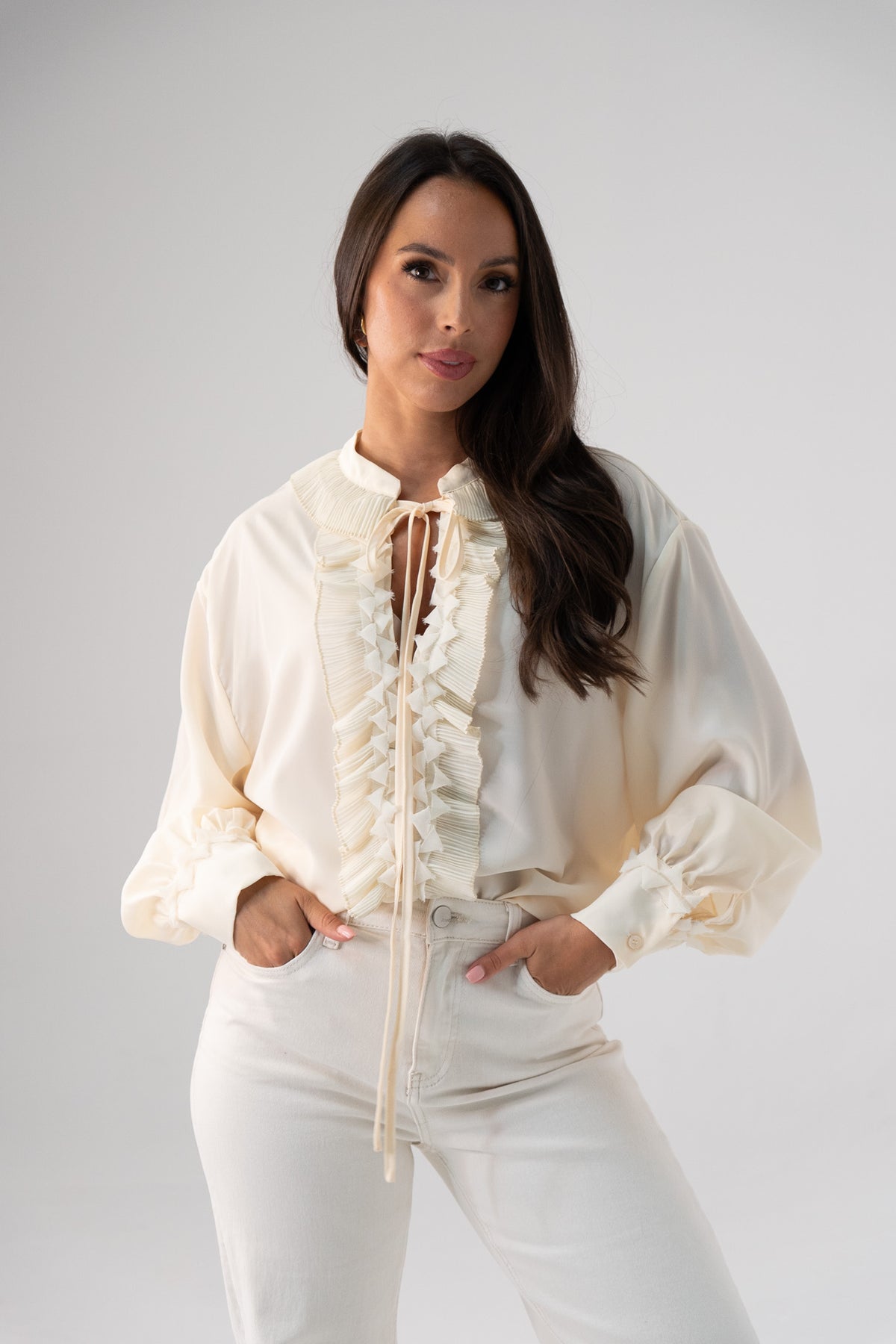 Kendra Tie Neck Ruffle Blouse In Cream