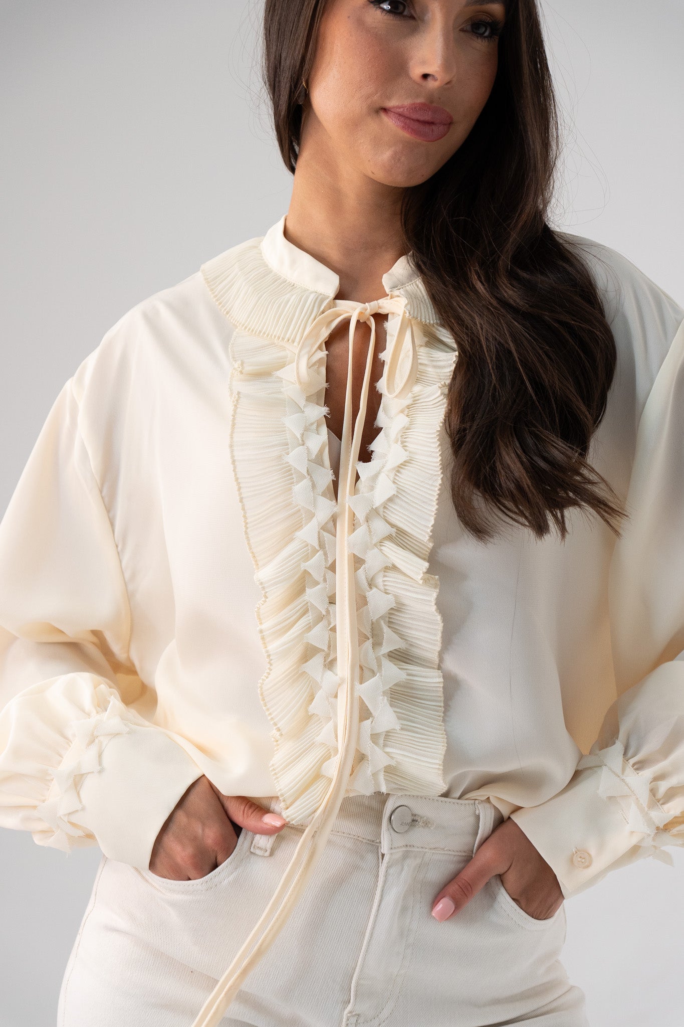 Kendra Tie Neck Ruffle Blouse In Cream