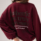 Melanie New York Graphic Sweatshirt In Bordeaux