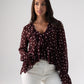 Millie Polka Dot Peplum Ruffle Top In Wine