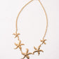 Olive Multi Starfish Necklace In Gold
