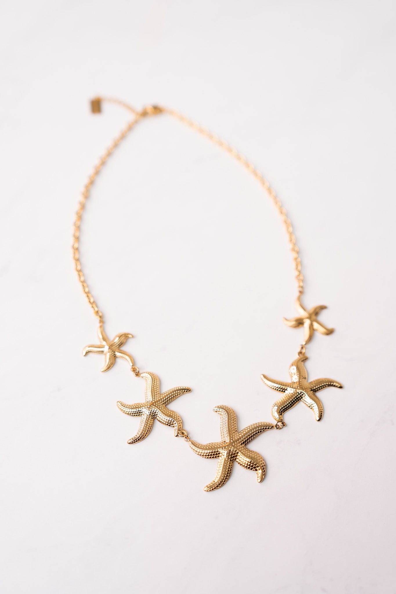 Olive Multi Starfish Necklace In Gold
